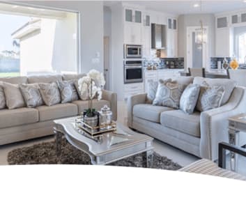 Elegant living room with grey white coaches